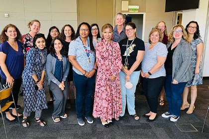 photo shows SJSU president with fifteen faculty