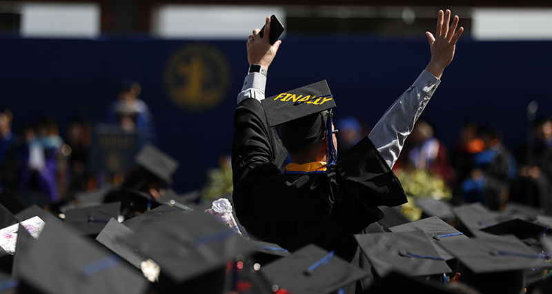 Students celebrating at graduation