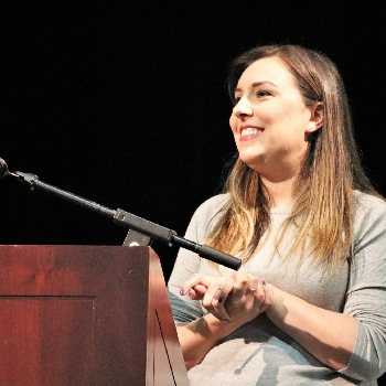 Woman at podium