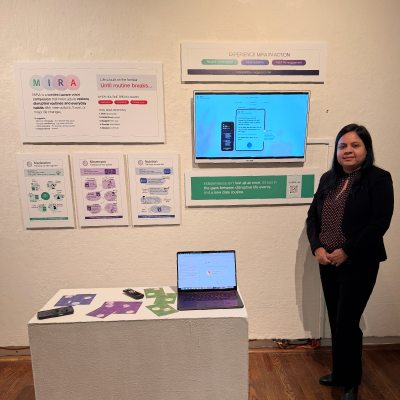 Sapna Bajaj posing in front of her work