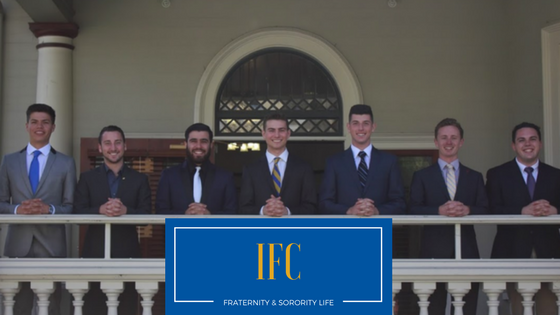 Group of young men with IFC banner