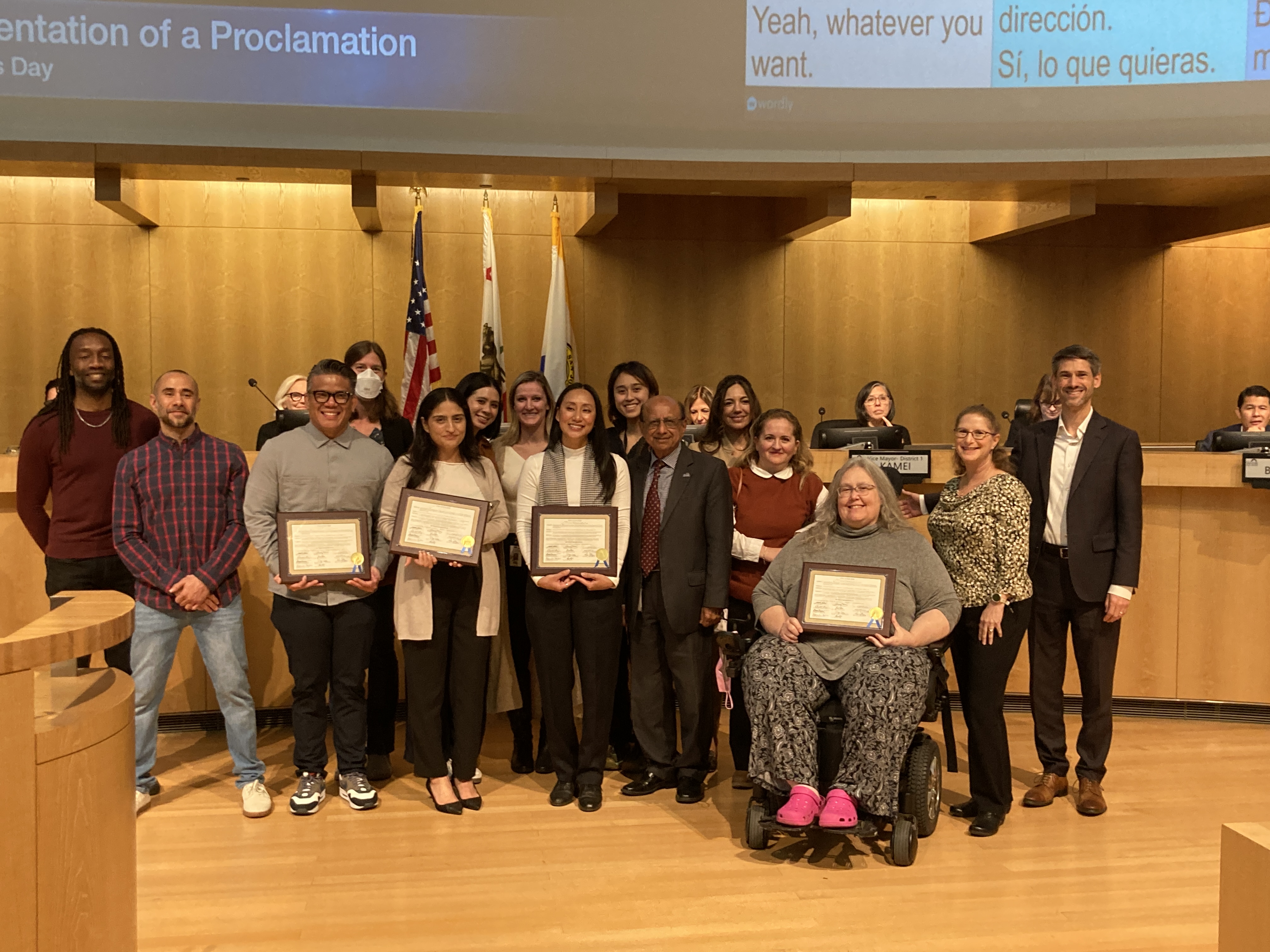 The HRI team alongside other organizations holding the proclamations presented by the City of San Jose