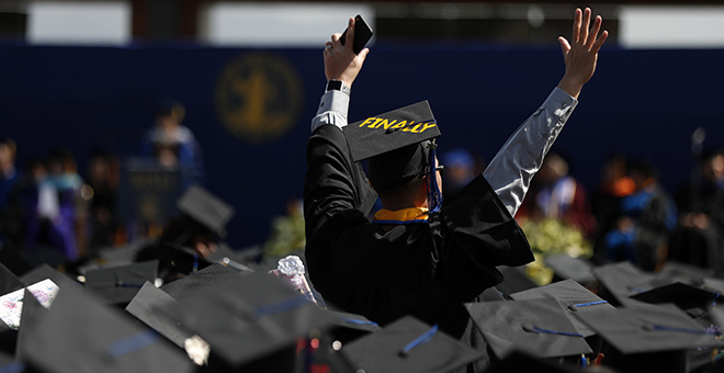 Students celebrating graduation