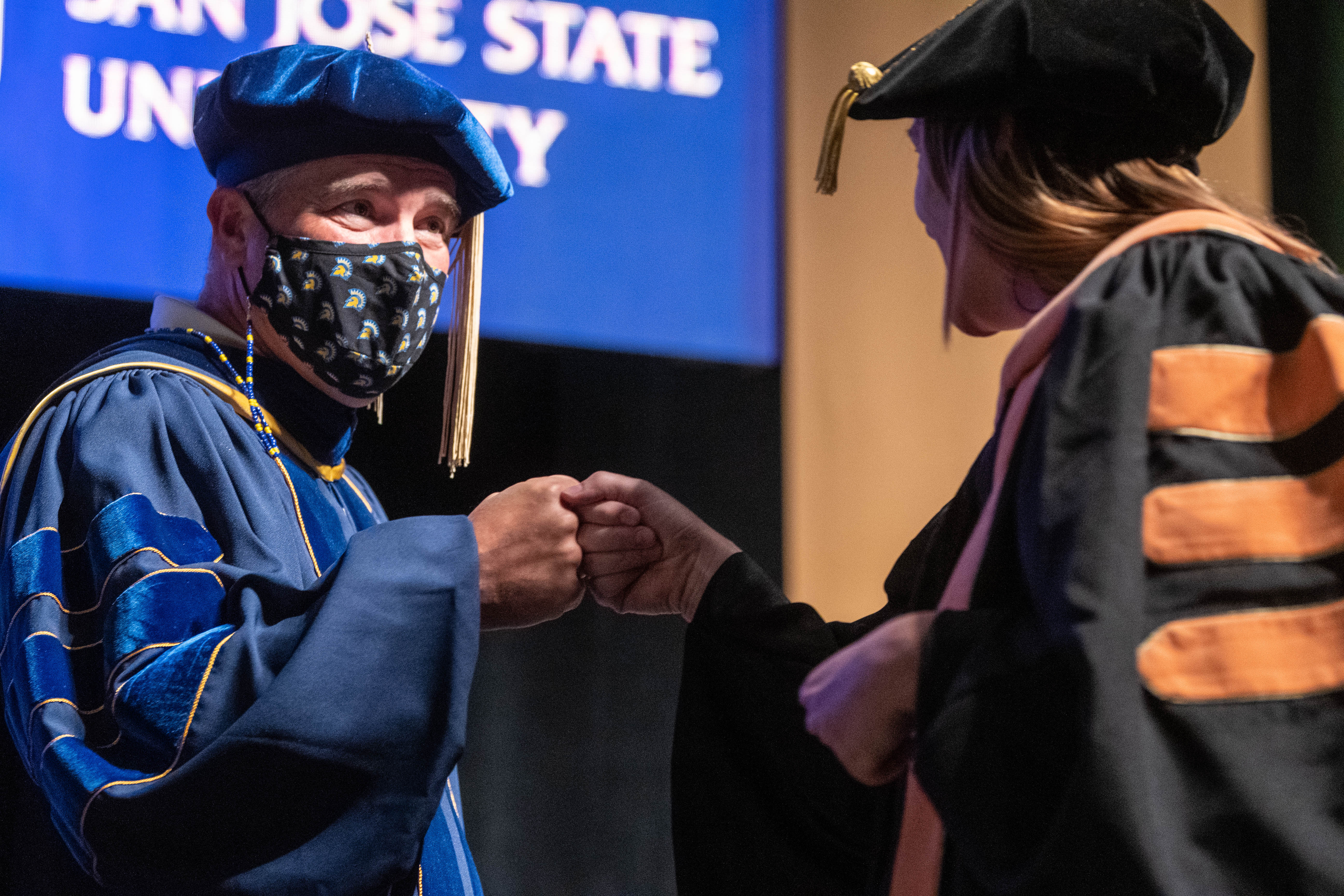 DNP graduate receiving honors at commencement.