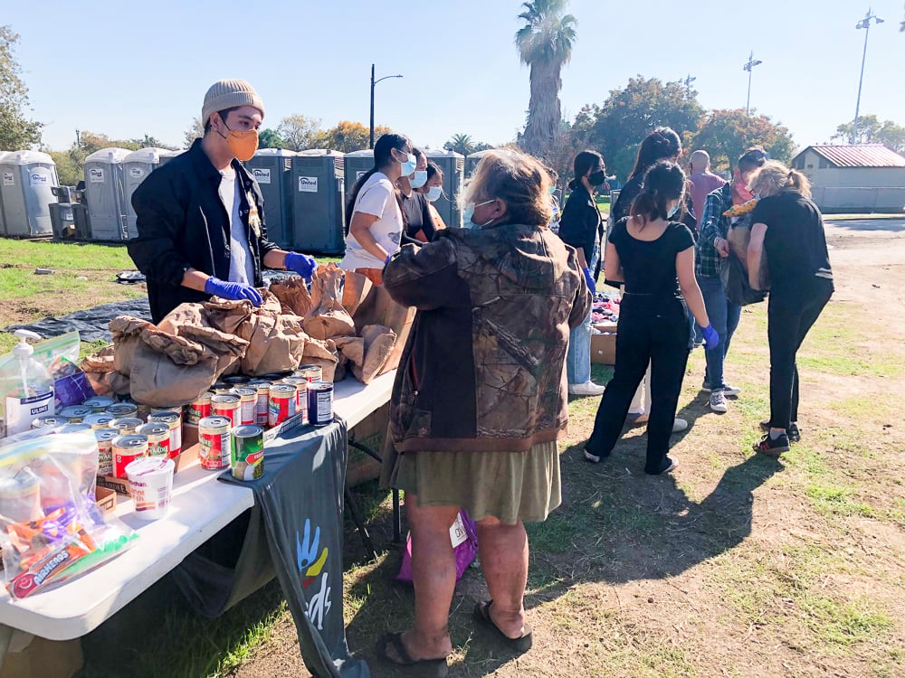 ATD members distributing food and hygeine kits.