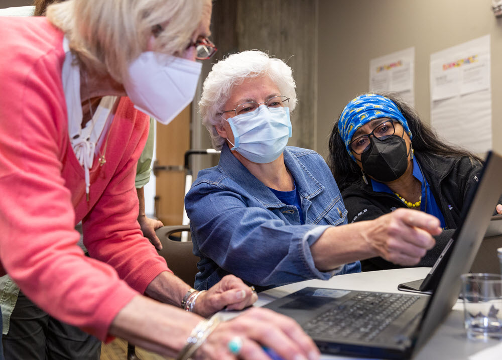 Three nursing educators - Daryl, Cornelia, and Paula - building curriculum.