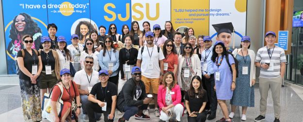 International group infront of an SJSU building