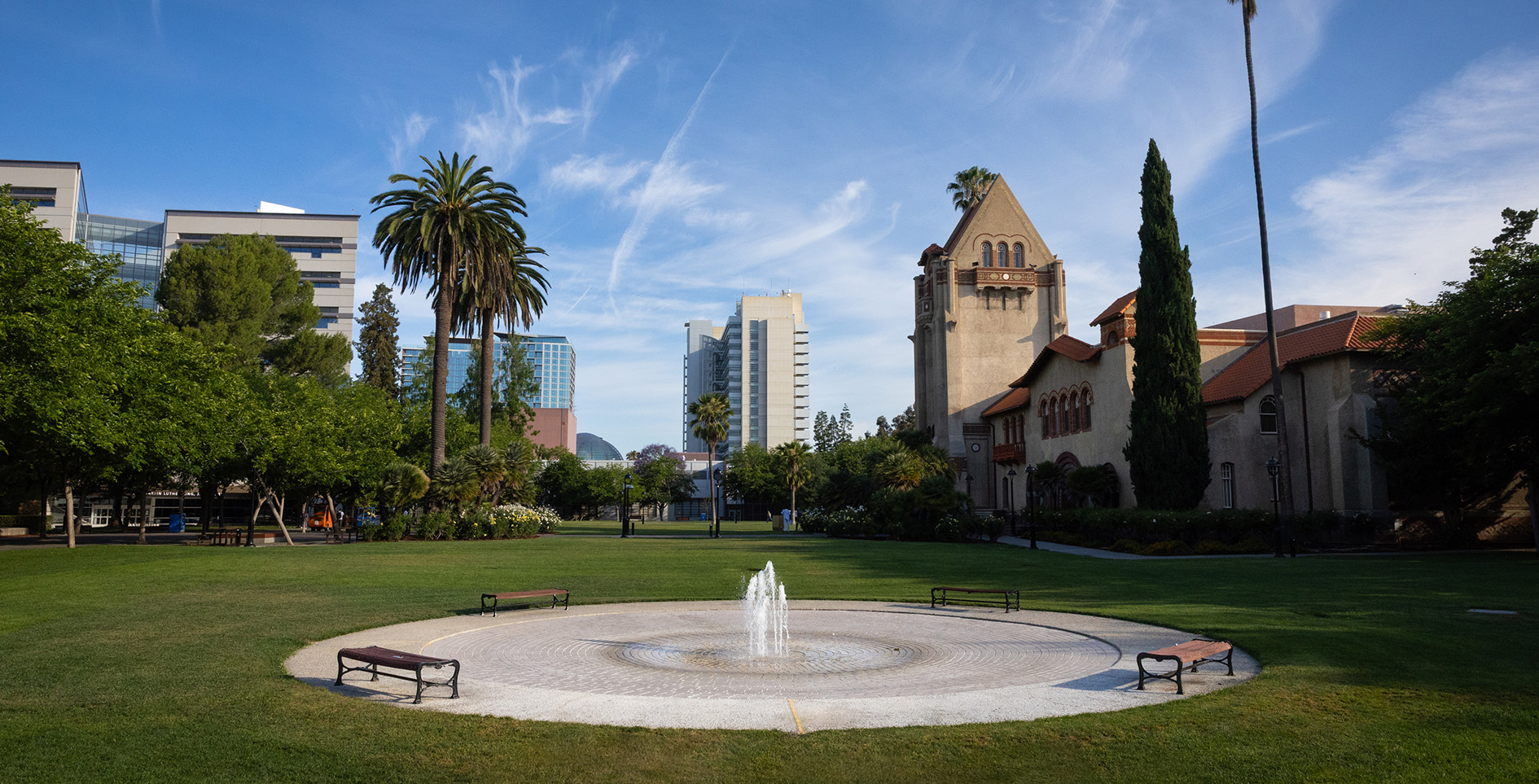 A view of Tower Hall, the campus fountain, and Tower Lawn at San José State University.