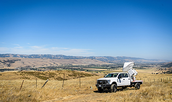 truck from the wildfire center sits in open field