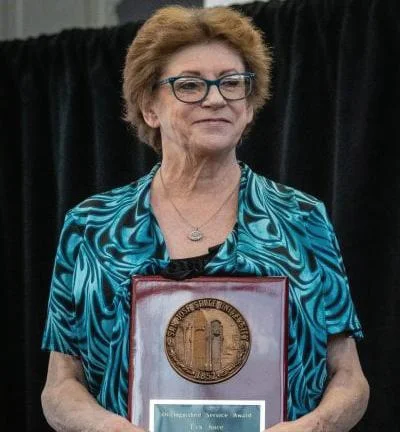 Picture of Eva Joice receiving Staff Award in 2023.