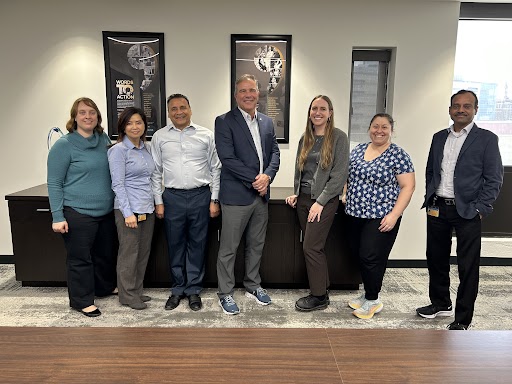 Staff Council Executive Committee members pose with Interim President Steve Perez